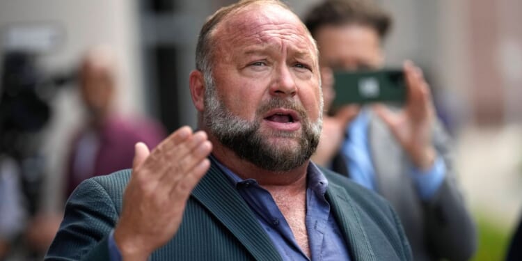 Alex Jones vows to fight on as satirists seek control of Infowars