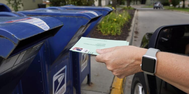 Democratic senators urge Postal Service to defy Trump order on mail-in voting