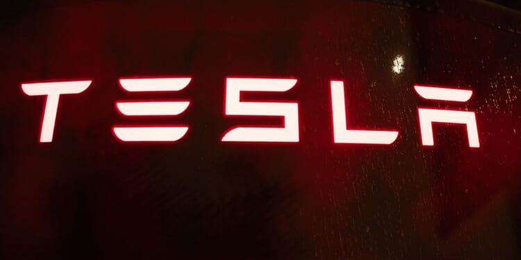 Tesla profits rose in the first quarter as Musk teases debut of new Roadster