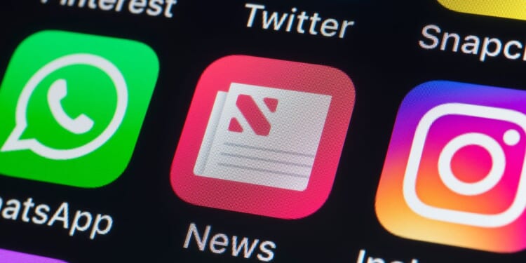 Apple News, WhatsApp, Instagram, Twitter, Snapchat, and other app buttons on the iPhone screen on July 24, 2018, in London, England.