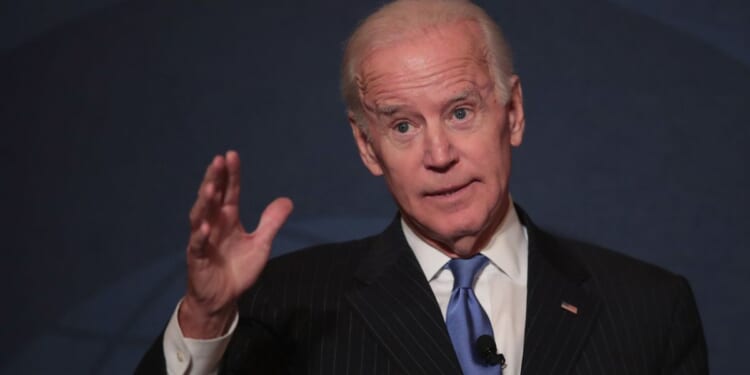 Then-former Vice President Joe Biden is seen in a photo from November 2017, the year he supposedly watched a rally and decided to "save" America by running for president.