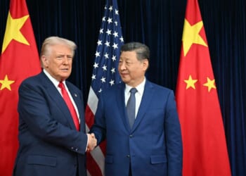 President Donald Trump and Chinese President Xi Jinping shake hands as they arrive for talks at the Gimhae Air Base, located next to the Gimhae International Airport in Busan on Oct. 30, 2025.