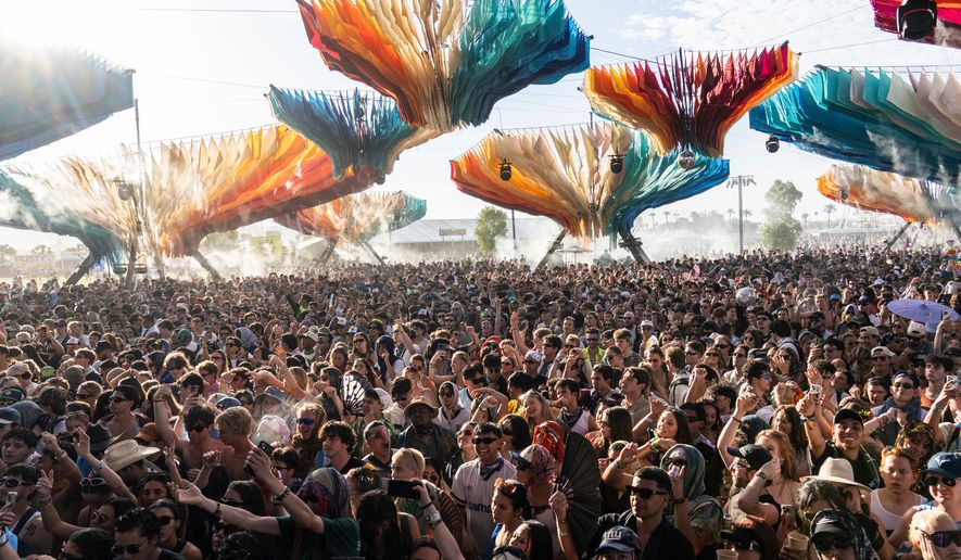 Festivalgoers are seen during the first weekend of the Coachella Valley Music and Arts Festival at the Empire Polo Club on Saturday, April 12, 2025, in Indio, Calif. (Photo by Amy Harris/Invision/AP, File)