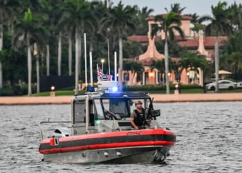 Members of the U.S. Coast Guard patrol the access point near President Donald Trump's Mar-a-Lago resort during the "No Kings" national day of protest, in Palm Beach, Florida, on May 28, 2026.