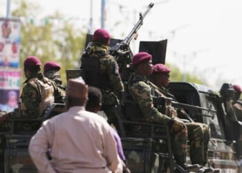 Soldiers patrol the streets in northern Nigeria in a file photo from Feb. 13. More thanr 25 people were killed over Easter weekend during several attacks in Nigeria.
