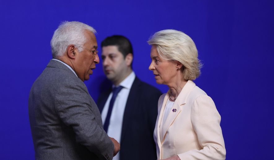 European Council President Antonio Costa, left, speaks with European Commission President Ursula von der Leyen during a round table meeting for the EU summit at Alden Biesen Castle in Bilzen-Hoeselt, Belgium, Thursday, Feb. 12, 2026. (AP Photo/Omar Havana) ** FILE **