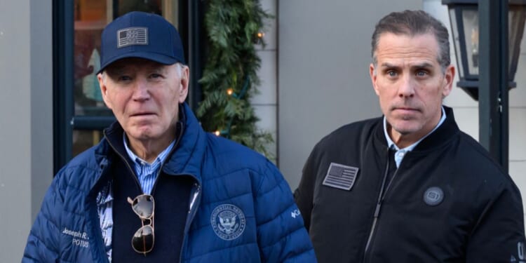 President Joe Biden and son Hunter Biden step out of a bookstore while shopping in Nantucket, Massachusetts, on Nov. 29, 2024.