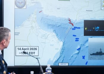 US Chairman of the Joint Chiefs of Staff General Dan Caine speaks as he looks at a map of the Strait of Hormuz in the Pentagon in Washington, DC on April 16, 2026.