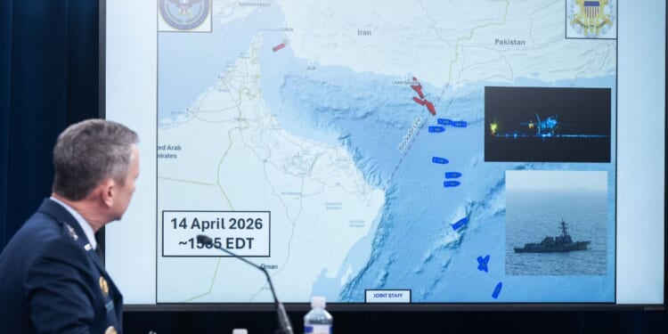 US Chairman of the Joint Chiefs of Staff General Dan Caine speaks as he looks at a map of the Strait of Hormuz in the Pentagon in Washington, DC on April 16, 2026.