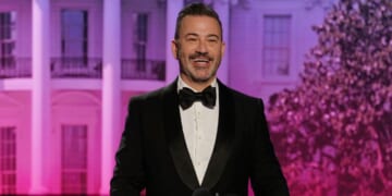 Jimmy Kimmel laughs at podium as he makes jokes to his crowd in a parody of the WHCD on April 23, 2026.