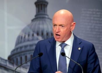 Sen. Mark Kelly speaks on the failed grand jury indictment against him during a news conference at the U.S. Capitol on Feb. 11, 2026, in Washington, D.C.