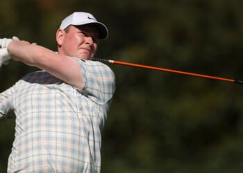 Robert MacIntyre of Scotland plays his shot Thursday from the 11th tee during the first round of the 2026 Masters Tournament at Augusta National Golf Club in Augusta, Georgia.