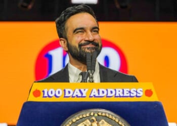 Mayor Zohran Mamdani of New York stands at a podium to deliver his 100 day address on April 12, 2026.