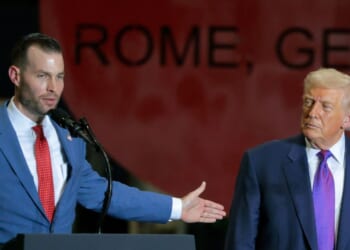 President Donald Trump looks on as Republican congressional candidate Clay Fuller speaks at the Coosa Steel Corporation on Feb. 19, 2026, in Rome, Georgia.