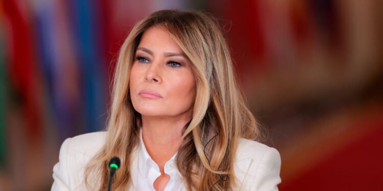 First Lady Melania Trump hosts the Fostering the Future Together Global Coalition Summit in the East Room at the White House on March 25, 2026, in Washington, D.C.