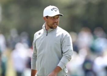 Xander Schauffele looks on from the 15th green during a practice round prior to the 2026 Masters Tournament at Augusta National Golf Club on April 8, 2026, in Augusta, Georgia.