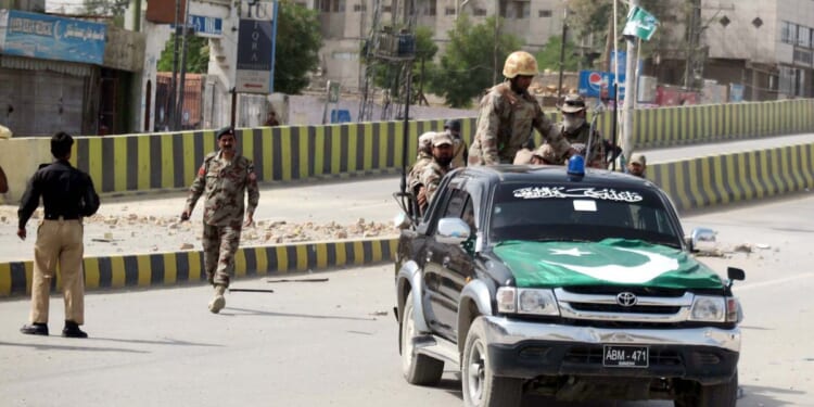Pakistan authorities cordon off an area after a bomb blast went off in Quetta, Pakistan on Aug. 11, 2016.
