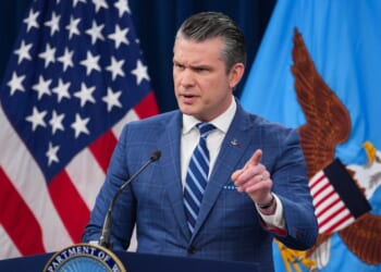 Secretary of War Pete Hegseth speaks during a press briefing at the Pentagon on April 8, 2026, in Arlington, Virginia.