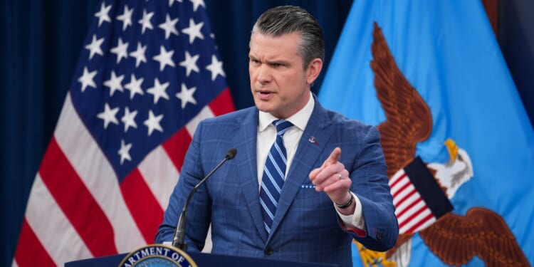 Secretary of War Pete Hegseth speaks during a press briefing at the Pentagon on April 8, 2026, in Arlington, Virginia.