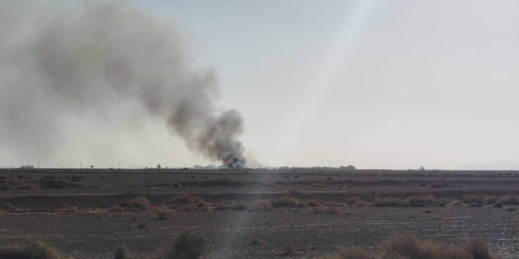 Wreckage is seen from what Iranian authorities say is a U.S. military helicopter that crashed during a mission to rescue the missing American pilot of an F-15E that was downed earlier this week, in a handout image provided on April 5, 2026, in an unspecified location in Iran.