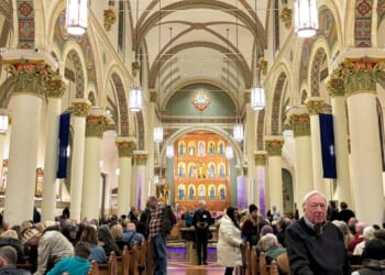 An audience waits in St Francis Cathedral for a Christmas concert to start on Dec. 9, 2025, in Santa Fe, New Mexico.