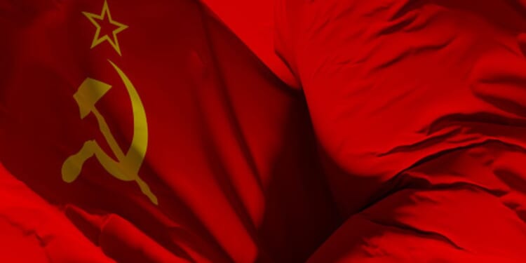 The Flag of the Soviet Union waves.