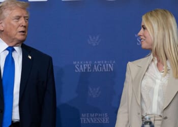 President Donald Trump interacts with then-Attorney General Pam Bondi March 23 at a "Making America Safe Again" meeting at the Memphis International Airport in Memphis, Tennessee.