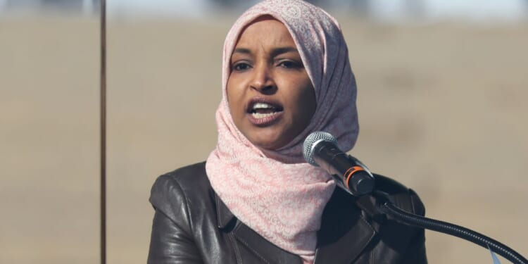 Congresswoman Ilhan Omar speaks onstage March 28 at a "No Kings" protest in St. Paul, Minnesota.