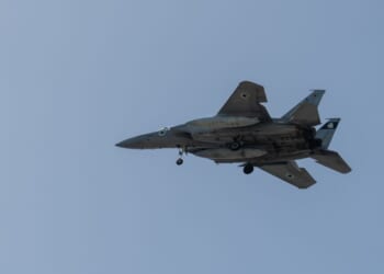 An F-15 fighter jet flies on March 20, 2026 in Rehovot, Israel.