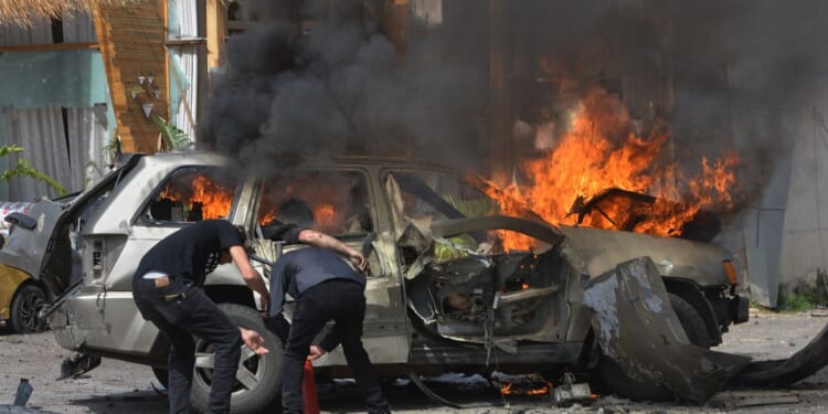 Israeli drone strikes hit highway south of Beirut, killing 8, including 2 children