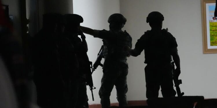 Gunfire breaks out in Philippine Senate where authorities have tried to arrest a senator