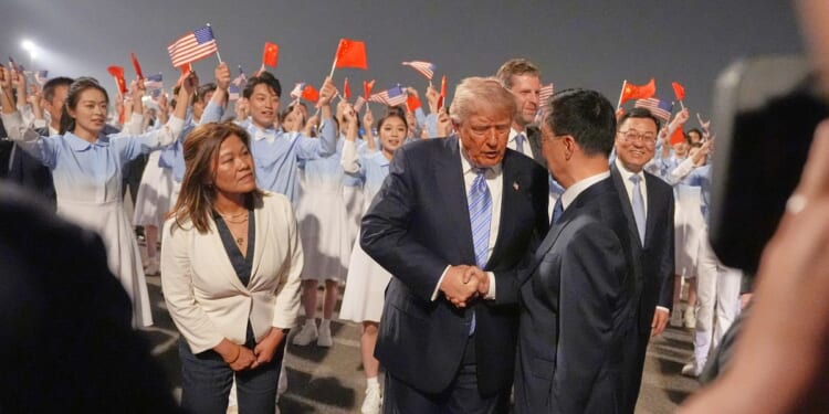 Trump arrives in Beijing for high-stakes meeting with Chinese President Xi