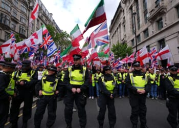 London police out in force dealing with rival rallies and a soccer final