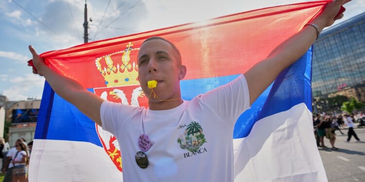 Tens of thousands rally in Serbia against authoritarian President Vucic