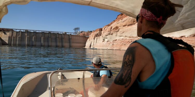 5 questions about the Glen Canyon Dam cool water debate