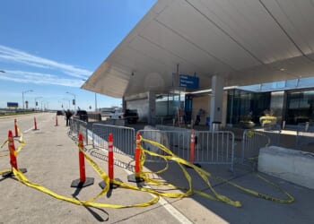 Car crashes into a passenger terminal at Detroit Metropolitan Airport, driver arrested