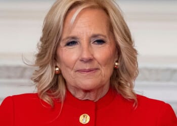 Jill Biden sits and looks during an event at the White House.