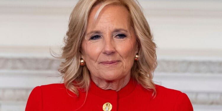 Jill Biden sits and looks during an event at the White House.