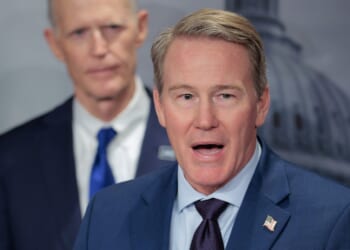 Sen. Jon Husted (R-OH) speaks to reporters during a news conference.