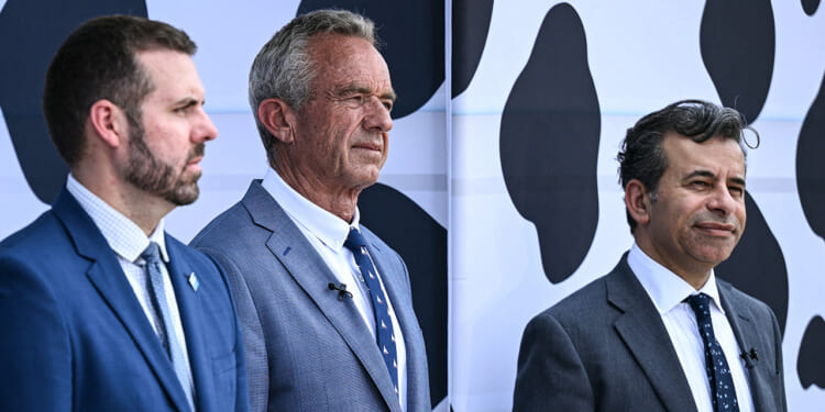 Kyle Diamantas, Robert F. Kennedy Jr., and Marty Makary (Brendan Smialowski/AFP.Getty Images)