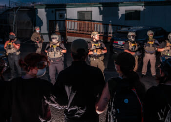 Protesters face off with ICE agents outside the federal immigration center at Delaney Hall, where ICE is housing detained immigrants on May 27, 2026 in Newark, New Jersey. The ongoing protests, which became tense over the holiday weekend, come amid reports of a hunger strike by detainees. (Photo by Adam Gray/Getty Images)