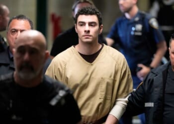 Luigi Mangione is escorted into the Manhattan state courthouse in New York on Sept. 16, 2025.