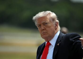 President Donald Trump waves after his arrival at Ocala International Airport, in Ocala, Florida, on May 1, 2026.