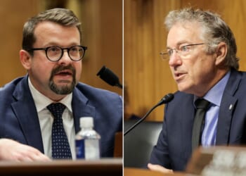 Sen. Rand Paul of Kentucky, right, questions CIA whistleblower James Erdman III, a senior operations officer, Wednesday during a hearing with the Senate Homeland Security Committee.