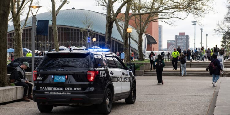 Police arrive at the encampment as pro-Palestinian students protest at the Massachusetts Institute of Technology in Cambridge, Massachusetts, on May 1, 2024.