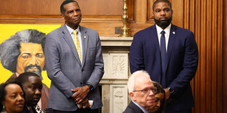 Burgess Owens and Byron Donalds in the newly named Frederick Douglas press gallery.