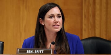 Sen. Katie Britt, seated