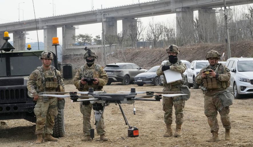 U.S. Army soldiers operate their drone during a joint river-crossing exercise between South Korea and the United States as a part of the Freedom Shield military exercise in Yeoncheon, South Korea, Saturday, March 14, 2026. (AP Photo/Ahn Young-joon) ** FILE **