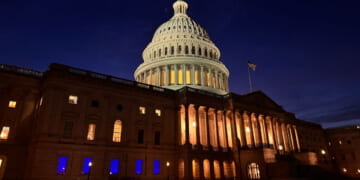 Blue lights honoring law enforcement officers can be seen shining out of Majority Whip Tom Emmers office in the U.S. Capitol in 2025.