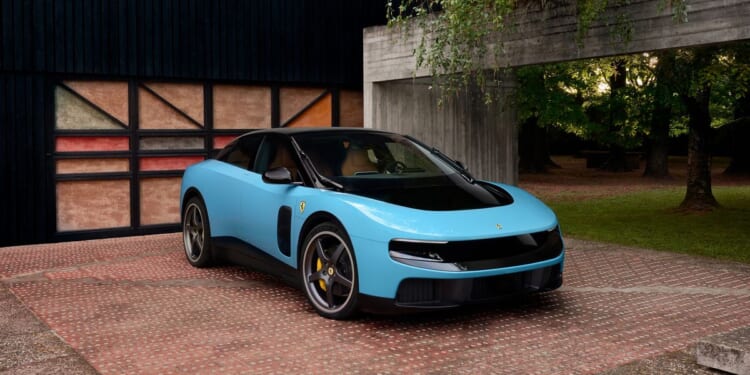 Ferrari shares tumble after automaker unveils first electric car